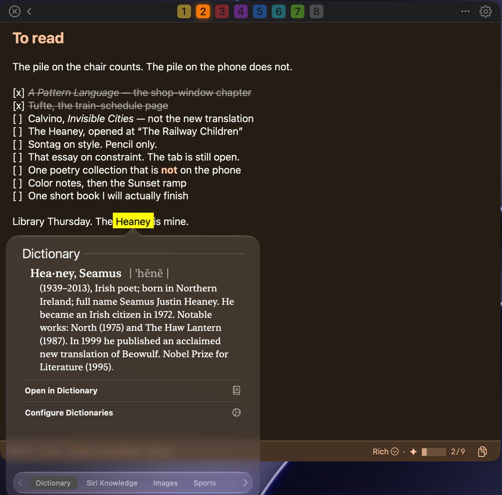 The orange reading list with the word Heaney highlighted and a Dictionary popover showing the entry for the poet Seamus Heaney.